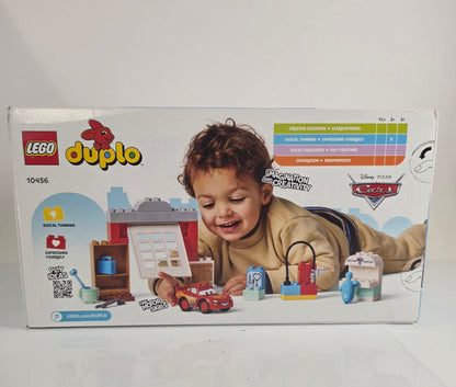 LEGO Duplo toy set packaging with a child playing on a white background